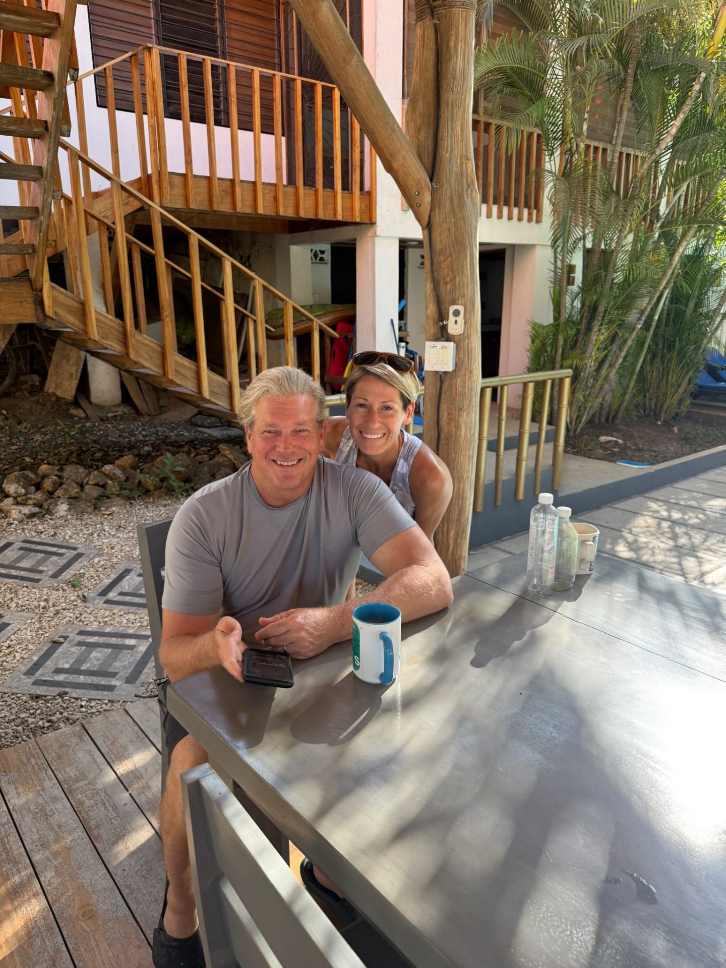 Chris and Jen, the owners of Hacienda Nosara, together at the villa at dusk.